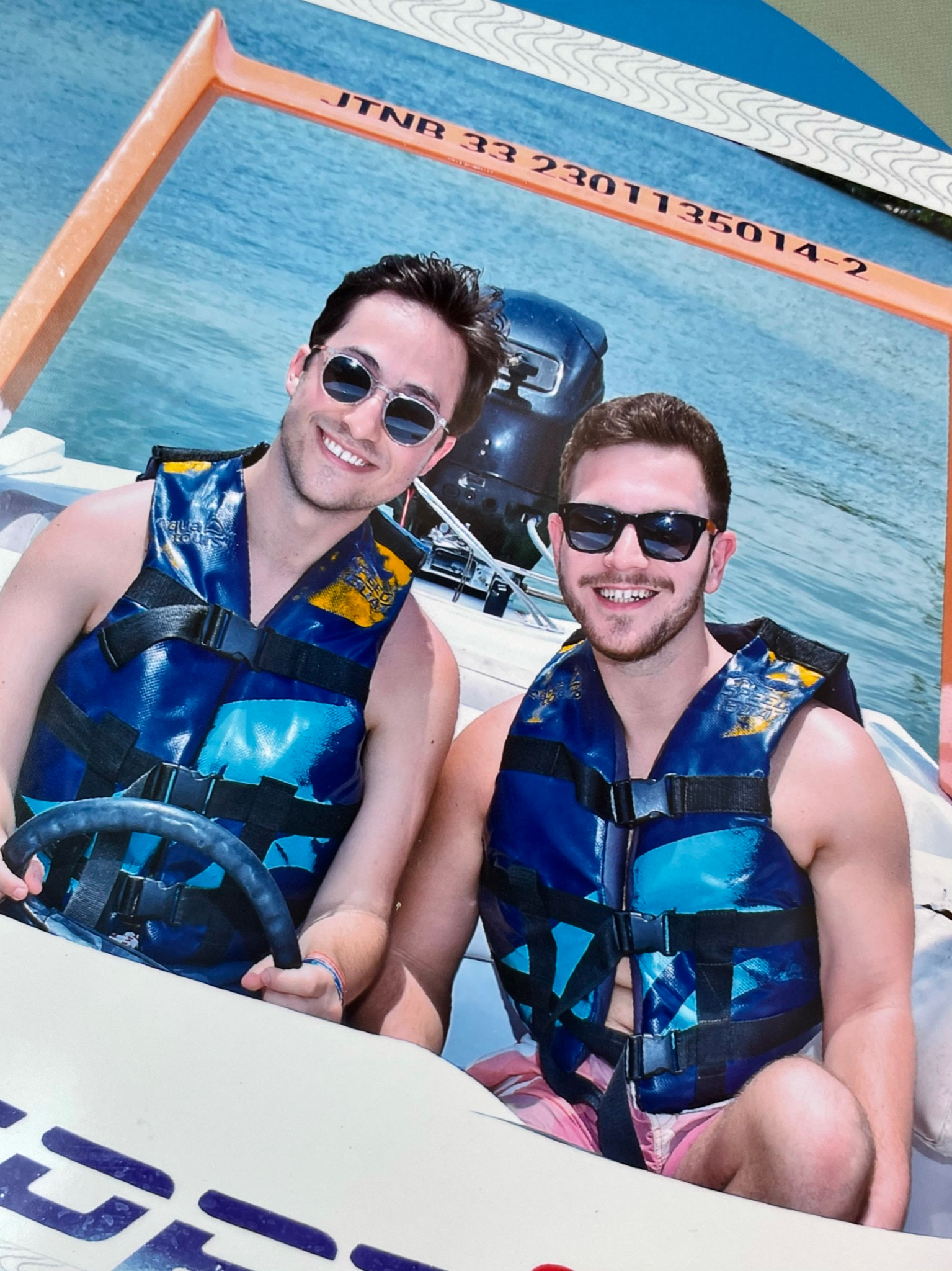 Phil and Zack together on a boat in Mexico