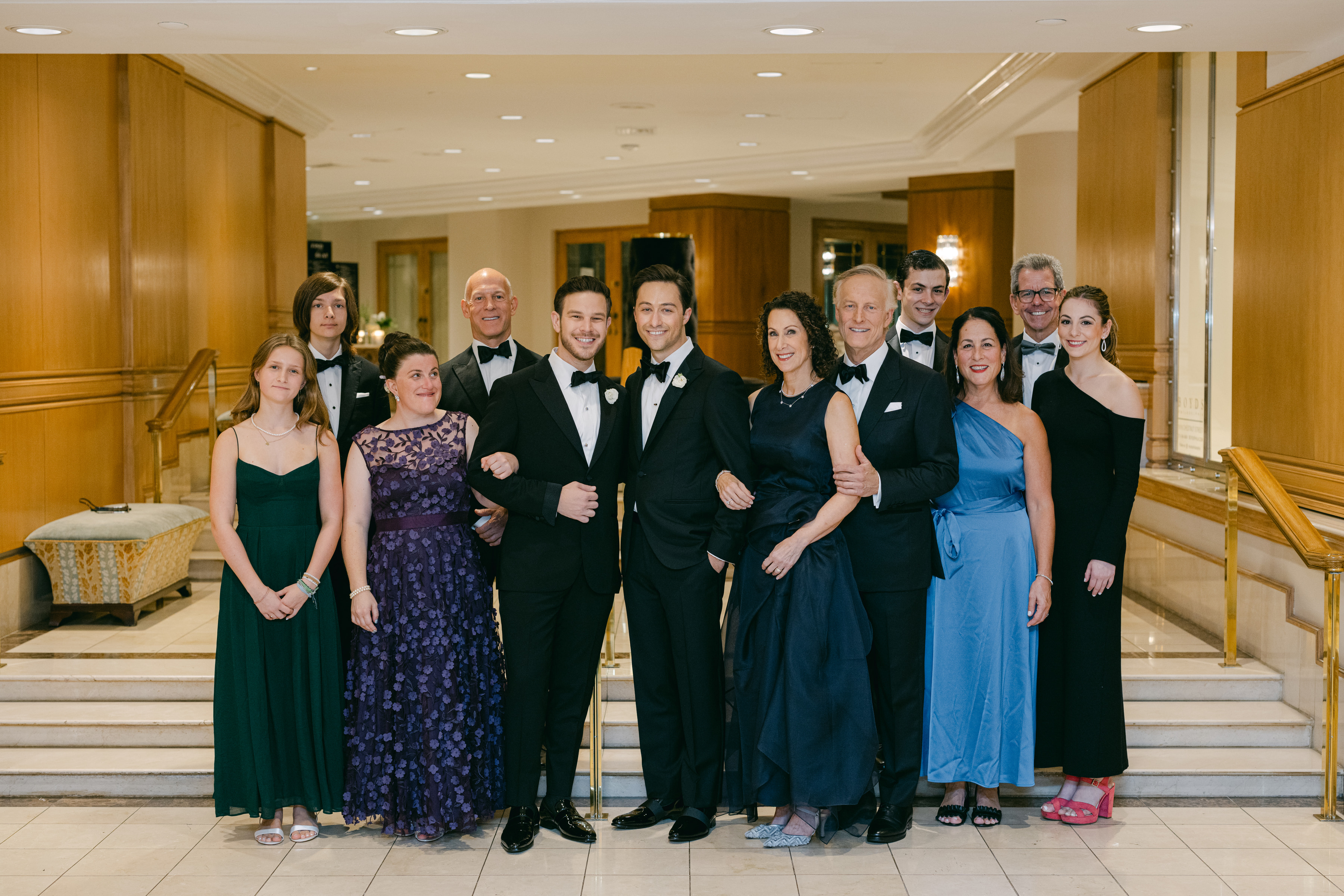 Phil and Zack with Phil's extended family at their wedding