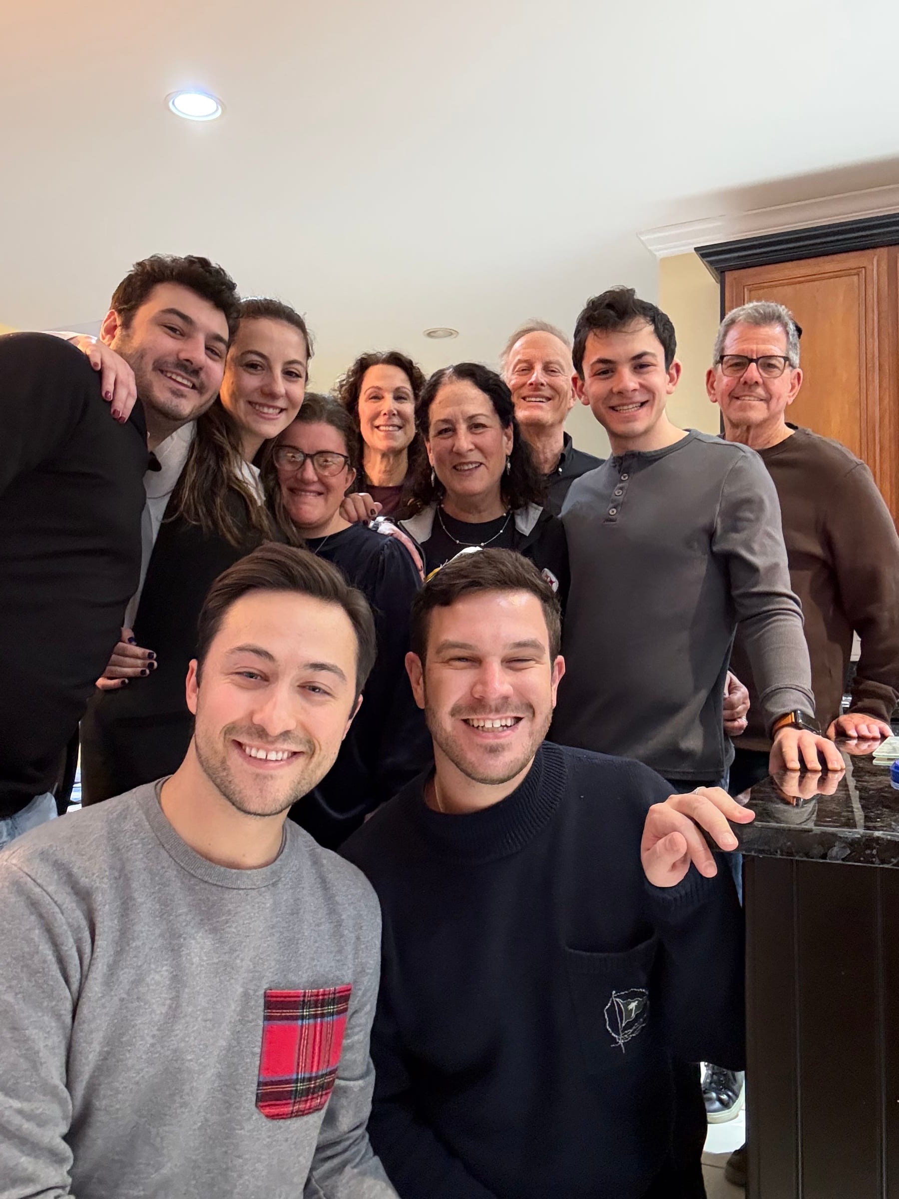 Phil and Zack with family and friends